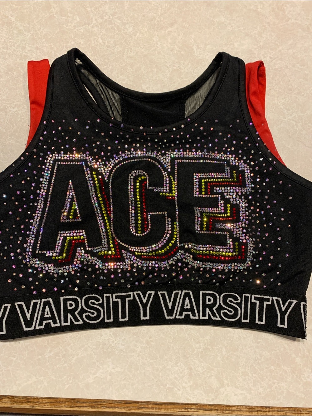 Varsity Black Rhinestone 'ACE' Cheer Crop Top with Red Accents.   Size YL